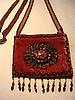 Light burgundy small purse w/ feathers